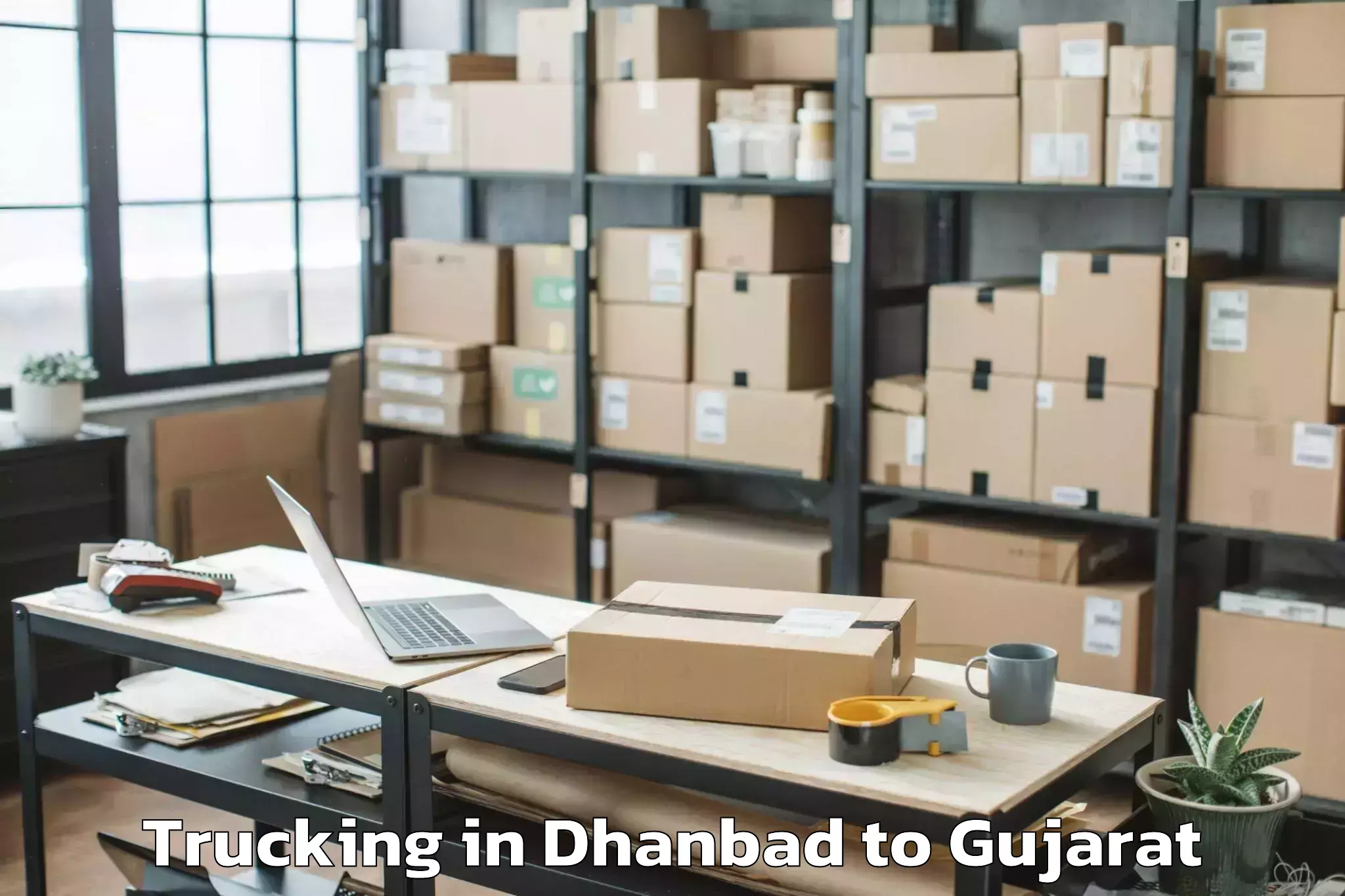 Professional Dhanbad to Umargam Trucking